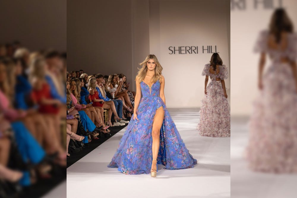 <p>Second-year fashion merchandising and retailing student Augusta Roach strolls the runway wearing Sherri Hill at New York Fashion Week on Sept. 9, 2022. Roach says this experience was one of the greatest of her modeling career so far.&nbsp;</p>