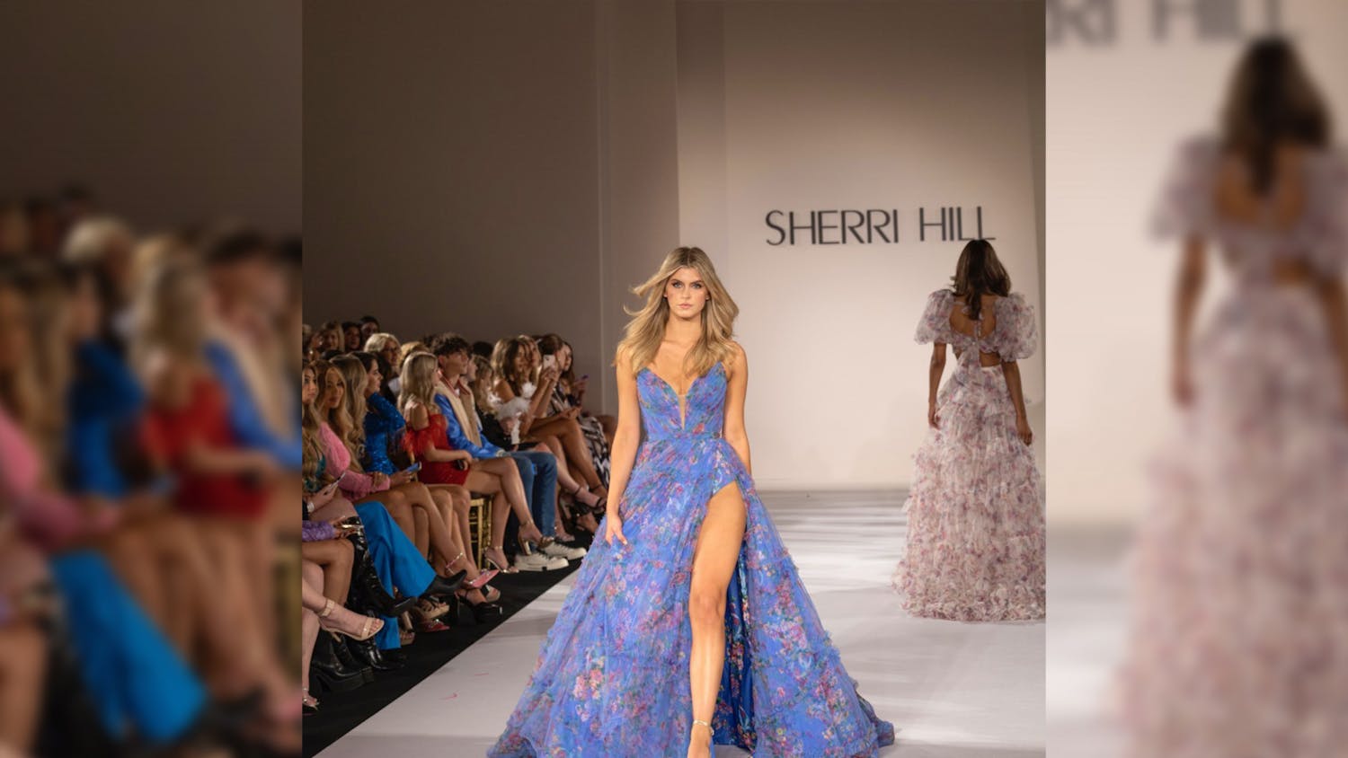 Second-year fashion merchandising and retailing student Augusta Roach strolls the runway wearing Sherri Hill at New York Fashion Week on Sept. 9, 2022. Roach says this experience was one of the greatest of her modeling career so far.&nbsp;