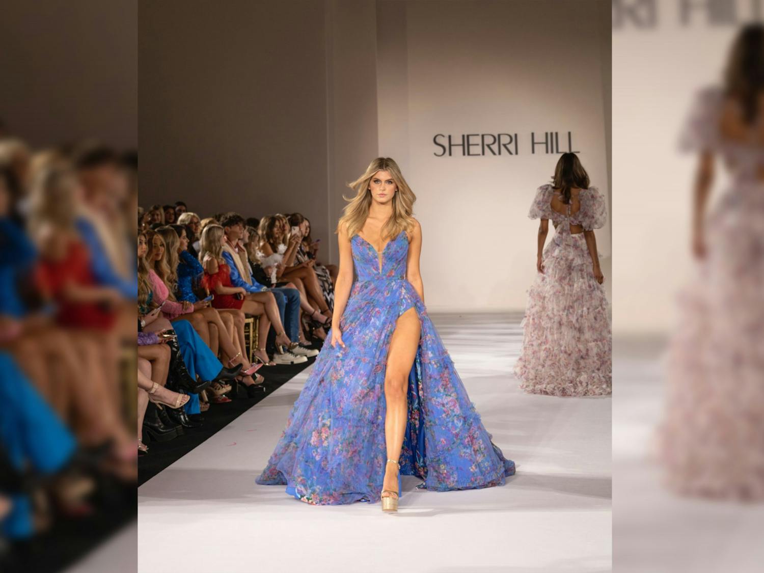Second-year fashion merchandising and retailing student Augusta Roach strolls the runway wearing Sherri Hill at New York Fashion Week on Sept. 9, 2022. Roach says this experience was one of the greatest of her modeling career so far.&nbsp;