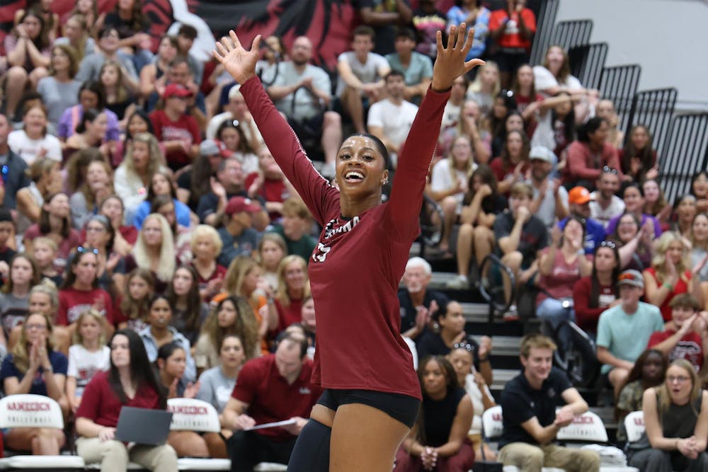 <p>FILE — Third-year outside hitter Nia Hall celebrates after scoring a point during the game against Clemson on Aug. 31, 2025. Hall made the most kills of the game, with 23 total.</p>