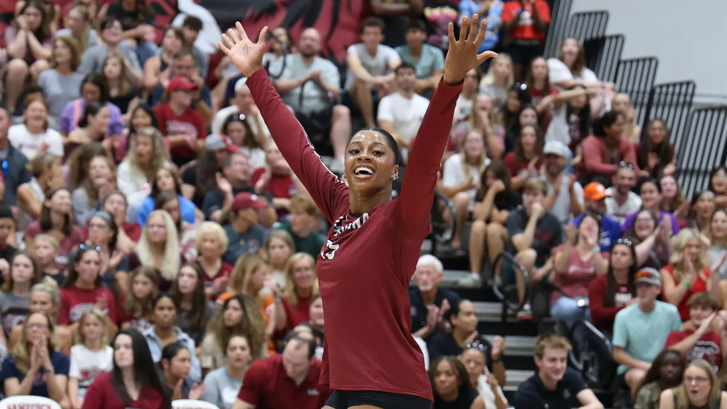 FILE — Third-year outside hitter Nia Hall celebrates after scoring a point during the game against Clemson on Aug. 31, 2025. Hall made the most kills of the game, with 23 total.