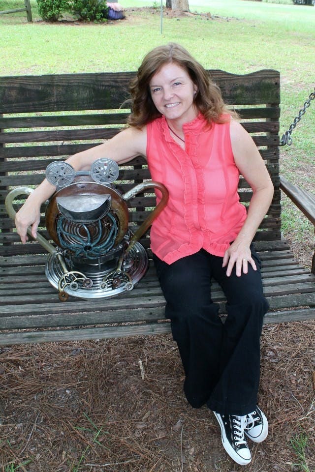 	Leanet Miller, whose work will appear at the annual South Carolina State Fair, adds a dash of creativity to what many would see as junk to create a work of art.