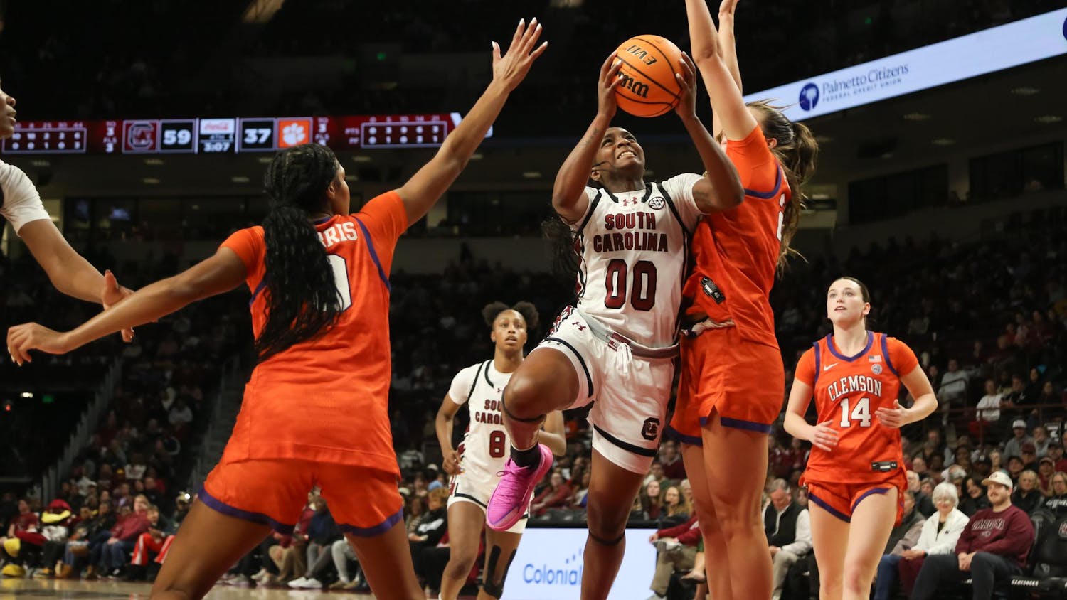 Senior guard Ta’Niya Latson goes for a layup over a defender from Clemson on Nov. 11, 2025, at Colonial Life Arena. Latson has scored 49 points on the season after the Gamecocks' 65-37 win over the Tigers.