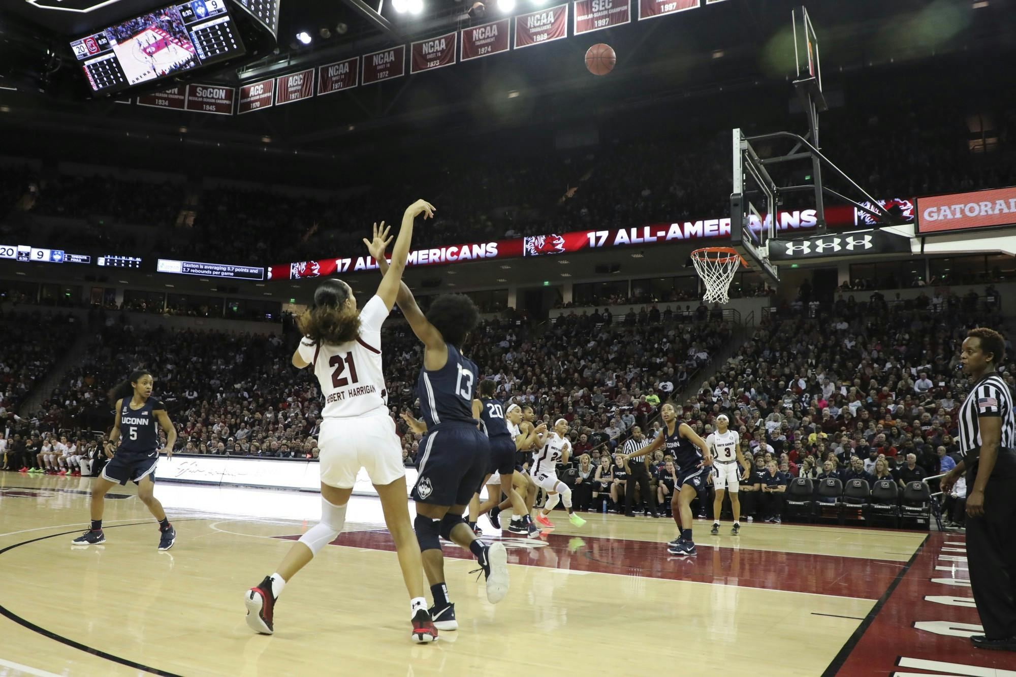 Senior forward Mikiah Herbert Harrigan shoots the ball in a scoring attempt. Harrigan scored 10 points, seven rebounds and two assists against the Huskies.