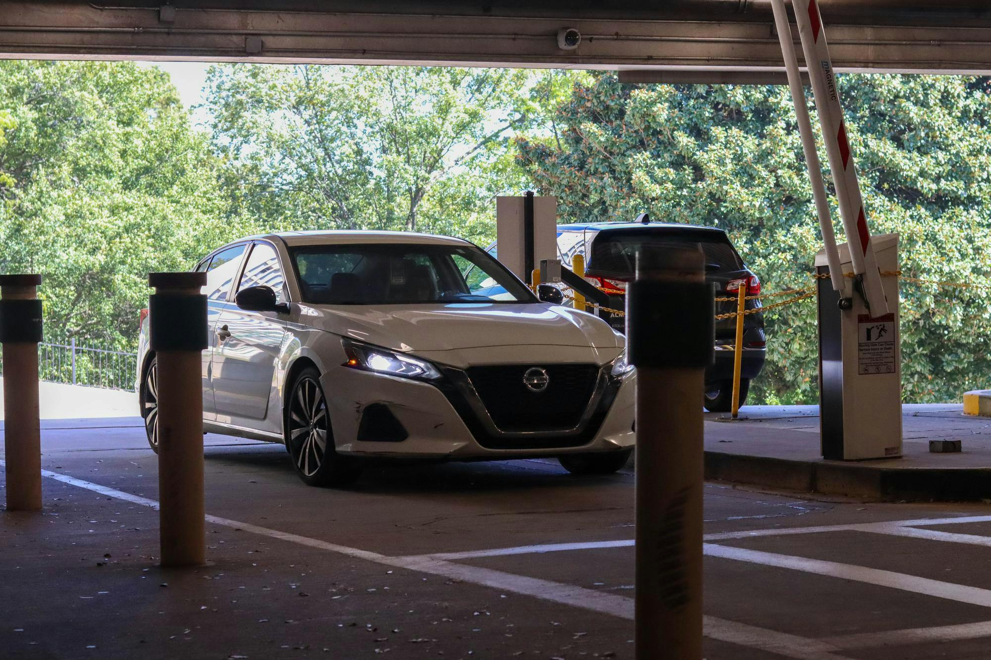 A car enters Bull Street Garage Gate 1 on Oct. 14, 2024. Bull Street hill backs up with traffic during the busy hours of campus as students and staff try to enter and leave the garage.&nbsp;