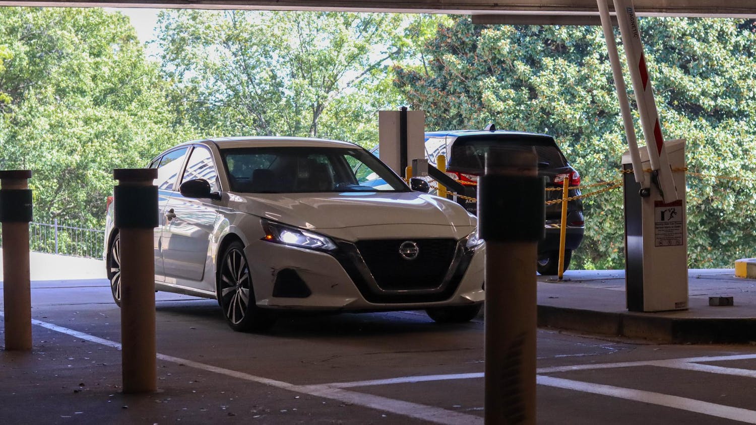 A car enters Bull Street Garage Gate 1 on Oct. 14, 2024. Bull Street hill backs up with traffic during the busy hours of campus as students and staff try to enter and leave the garage. 