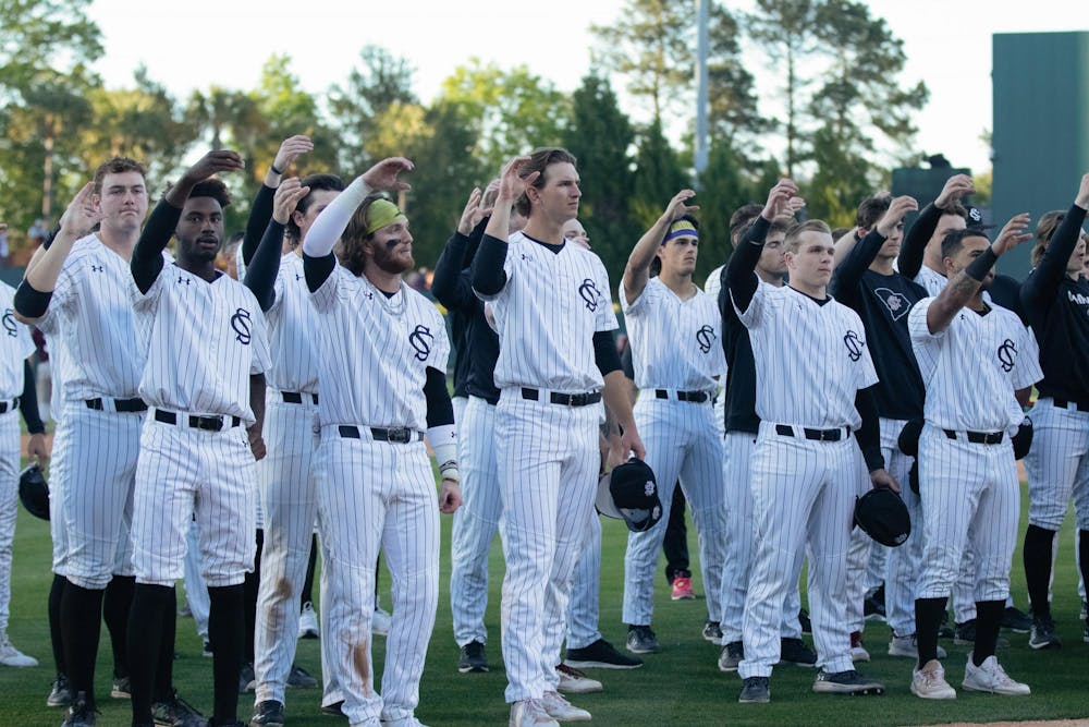 <p>University of South Carolina baseball players make a toast while the alma mater plays after a loss to Texas A&amp;M on April 6, 2024. The Gamecocks are 21-10 overall on the 鶹С򽴫ý.</p>