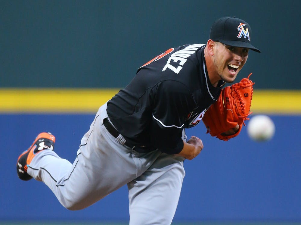 Miami Marlins pitcher Jose Fernandez works against the Atlanta Braves during the first inning at Turner Field in Atlanta on Tuesday, April 22, 2014. (Curtis Compton/Atlanta Journal-Constitution/MCT)