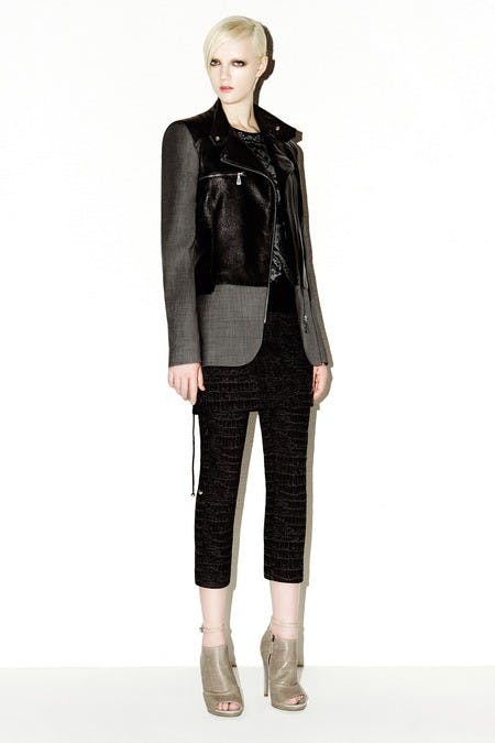 	This leather jacket and nude zippered heels makes a great contrast in McQ by Alexander McQueen.