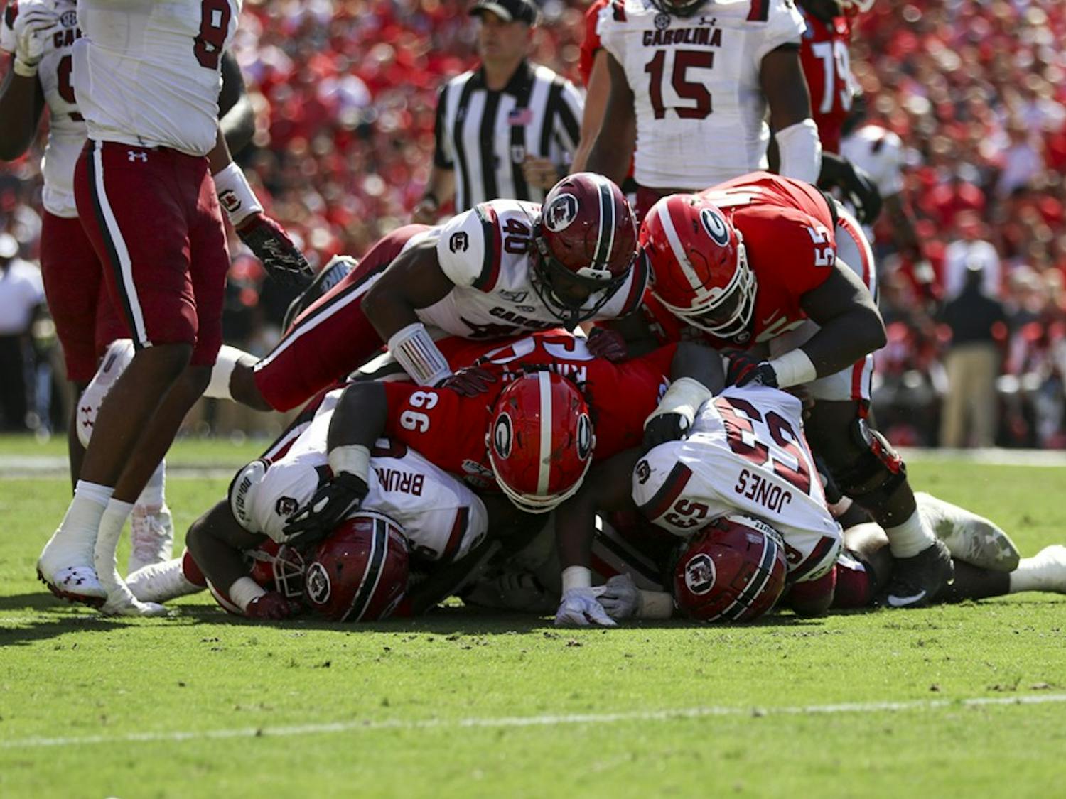 The Gamecocks recover a fumble during the UGA game Saturday.
