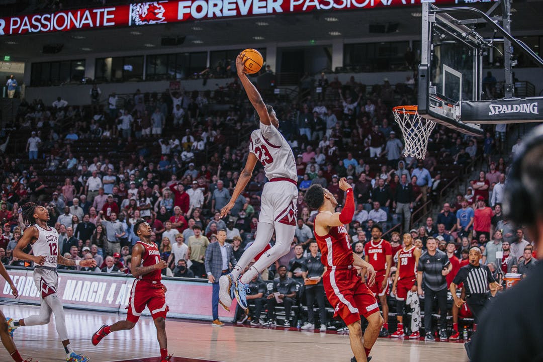 Freshman forward GG Jackson extends his arm back for the tomahawk dunk during the fast break in the match against Alabama at Colonial Life Arena on Feb. 22, 2023. The Crimson Tide beat the Gamecocks 78-76 in overtime.&nbsp;