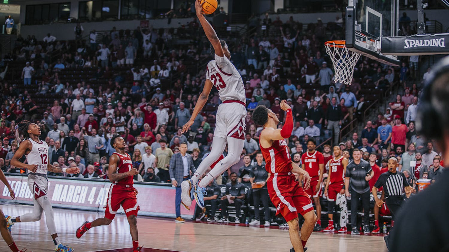 Freshman forward GG Jackson extends his arm back for the tomahawk dunk during the fast break in the match against Alabama at Colonial Life Arena on Feb. 22, 2023. The Crimson Tide beat the Gamecocks 78-76 in overtime.&nbsp;
