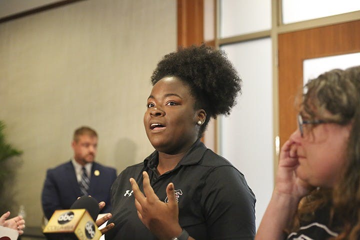 Third-year sports and entertainment management major Lyric Swinton speaks to student, faculty, reporters following the announcement of the Board of trustees selecting Gen. Robert Caslen as the 29th president of the University of South Carolina. 