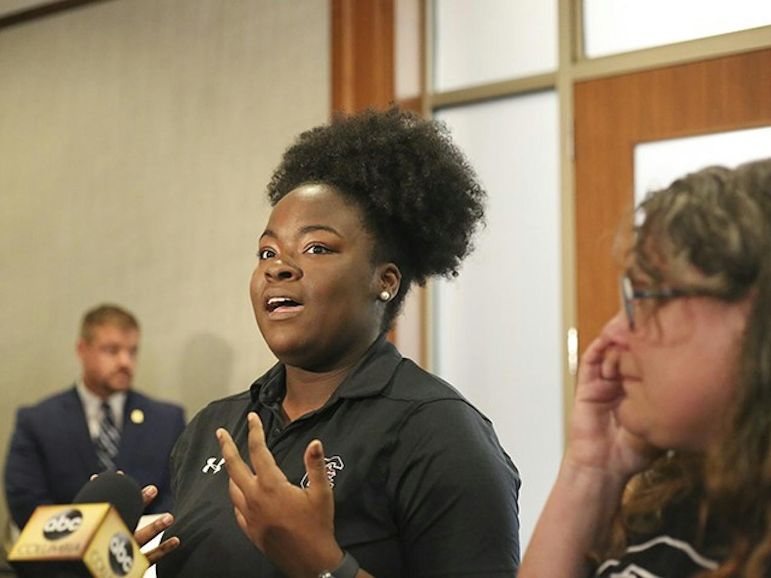 Third-year sports and entertainment management major Lyric Swinton speaks to student, faculty, reporters following the announcement of the Board of trustees selecting Gen. Robert Caslen as the 29th president of the University of South Carolina. 
