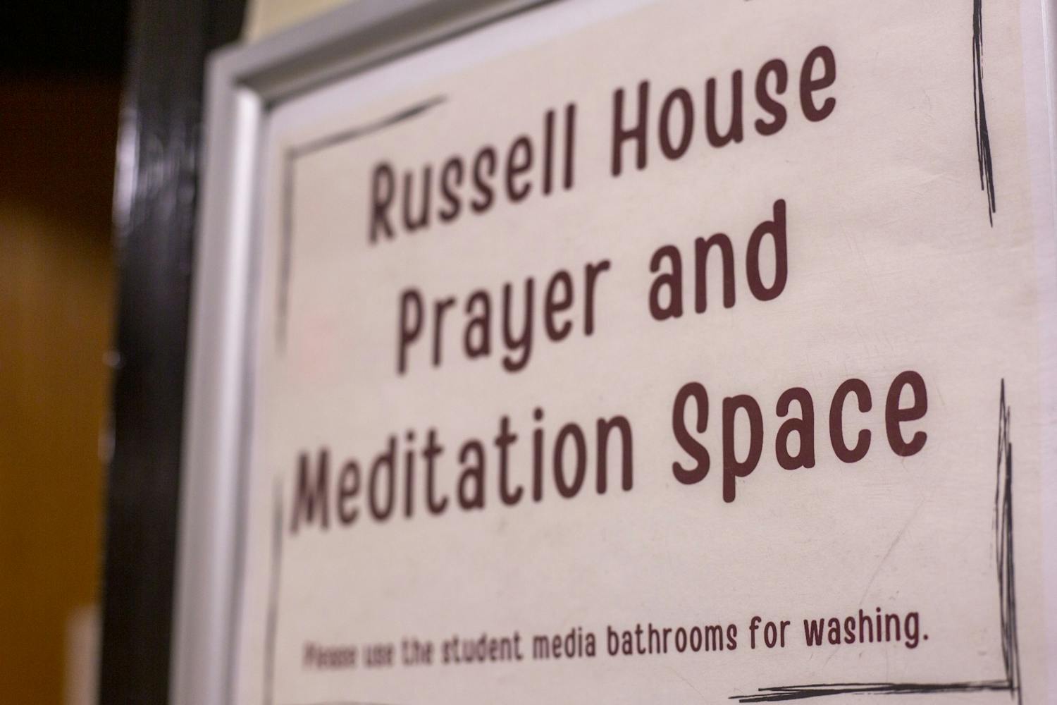 Sign in front of the entrance to the Russell House Prayer and Meditation Space on January 31, 2022. The Office of Multicultural Student Affairs created the room to serve as a suitable and permanent place for religious prayers and meditation in the middle of campus. 
