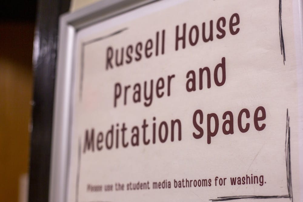 Sign in front of the entrance to the Russell House Prayer and Meditation Space on January 31, 2022. The Office of Multicultural Student Affairs created the room to serve as a suitable and permanent place for religious prayers and meditation in the middle of campus. 