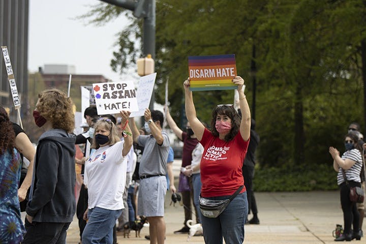 A group of protesters gather outside the South Carolina Statehouse to speak out against anti-Asian hate. The protest follows events that occurred in Atlanta, GA a week earlier.