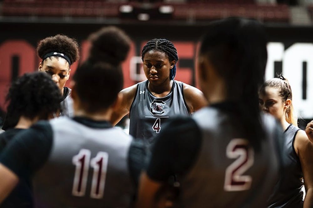 Sophomore forward Aliyah Boston stands in a huddle with her fellow teammates during the first official practice of the season.