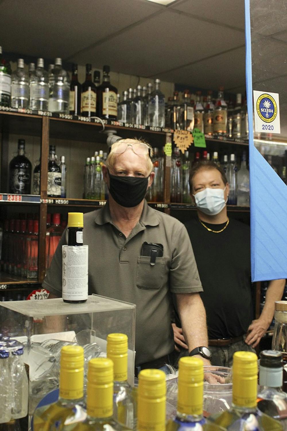 <p>Jimmie and Fred Alverson pose behind the counter of Jimmie and Son. They decided they wanted to open a business together in 2008.</p>