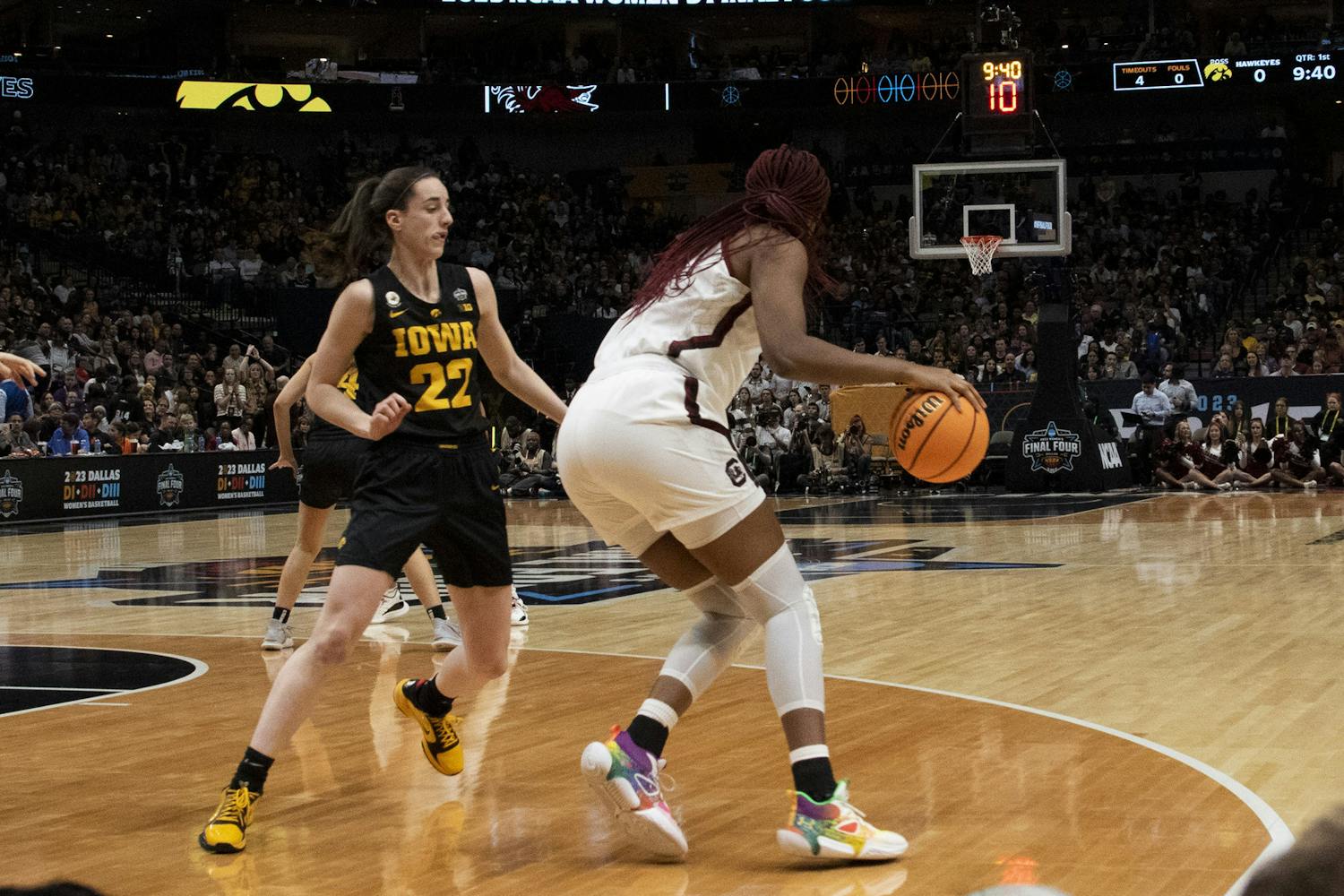 Senior forward Aliyah Boston back towards the paint against Iowa junior guard Caitlin Clark during the Final Four matchup in Dallas, Texas, on March 31, 2023. The game drew a peak audience of 6.6 million viewers with an average of 5.5 million.