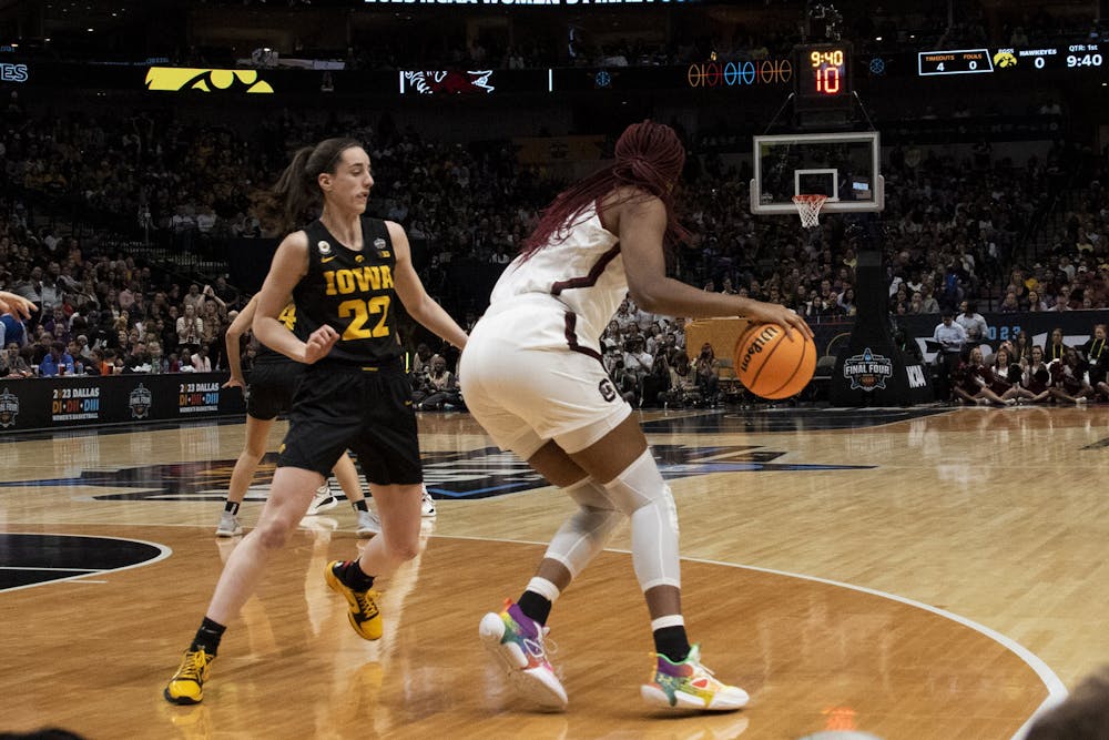 <p>Senior forward Aliyah Boston back towards the paint against Iowa junior guard Caitlin Clark during the Final Four matchup in Dallas, Texas, on March 31, 2023. The game drew a peak audience of 6.6 million viewers with an average of 5.5 million.</p>