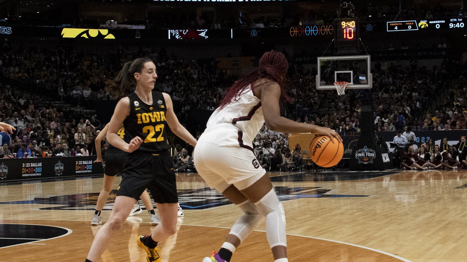 Senior forward Aliyah Boston back towards the paint against Iowa junior guard Caitlin Clark during the Final Four matchup in Dallas, Texas, on March 31, 2023. The game drew a peak audience of 6.6 million viewers with an average of 5.5 million.