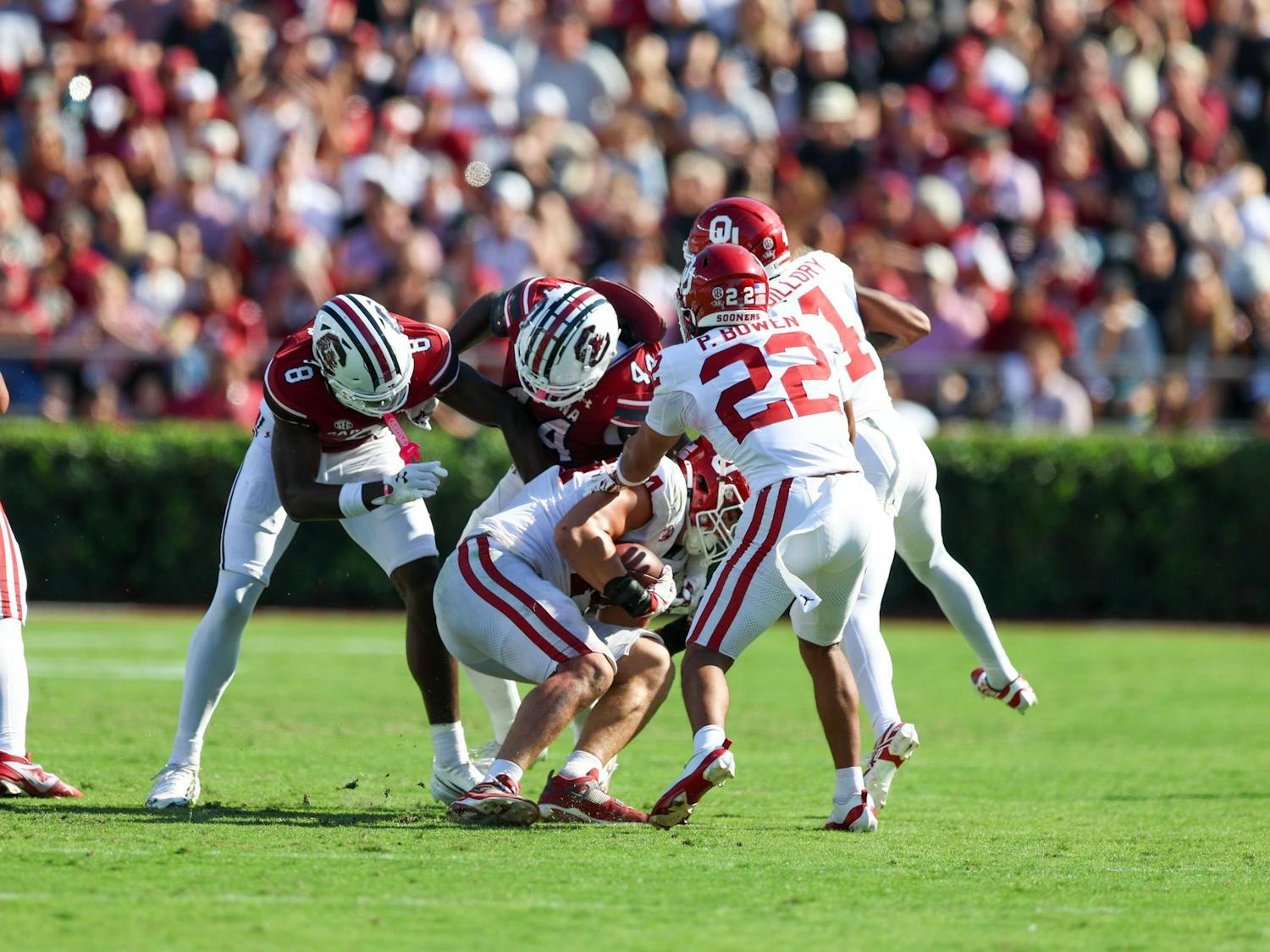 FILE — An Oklahoma defender carries the football after catching an interception from freshman quarterback Cutter Woods on Oct. 18, 2025, at Williams-Brice Stadium. The Gamecocks have thrown nine interceptions on the season.