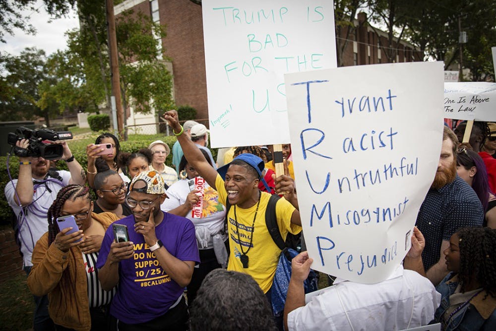 Protesters and President Trump supporters clash outside Benedict College Oct. 25.