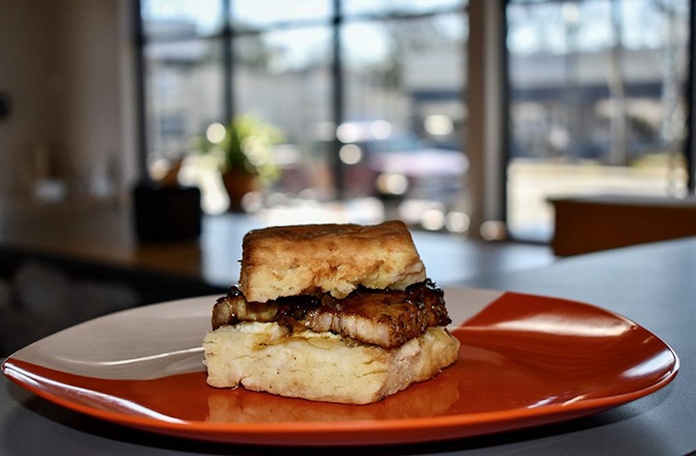The seared pork belly biscuit is a popular menu item at Rambo's.