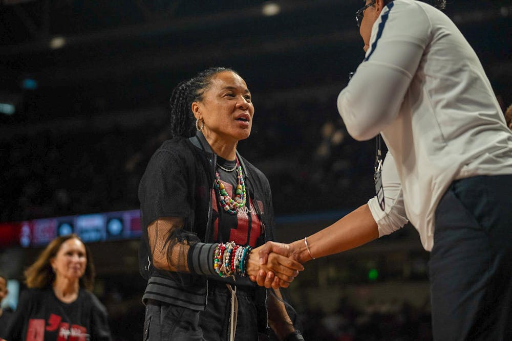 <p>FILE —&nbsp;Head coach Dawn Staley handshakes the opposing staff members before the matchup against the Auburn Tigers on Feb. 2, 2025. The Gamecocks will face off against the Tigers, led by first-year head coach Larry Vickers, on Thursday.</p>
