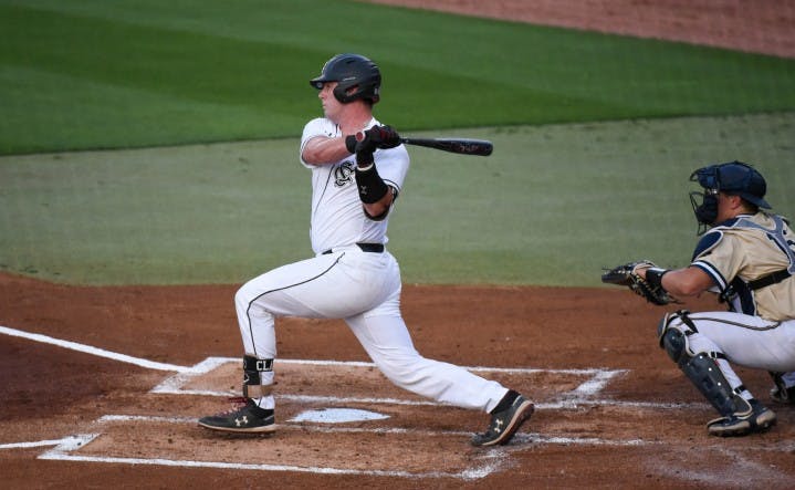 Junior catcher Wes Clarke swings at a pitch during South Carolina's game against Charleston Southern. The Gamecocks won 9-0 on Tuesday.