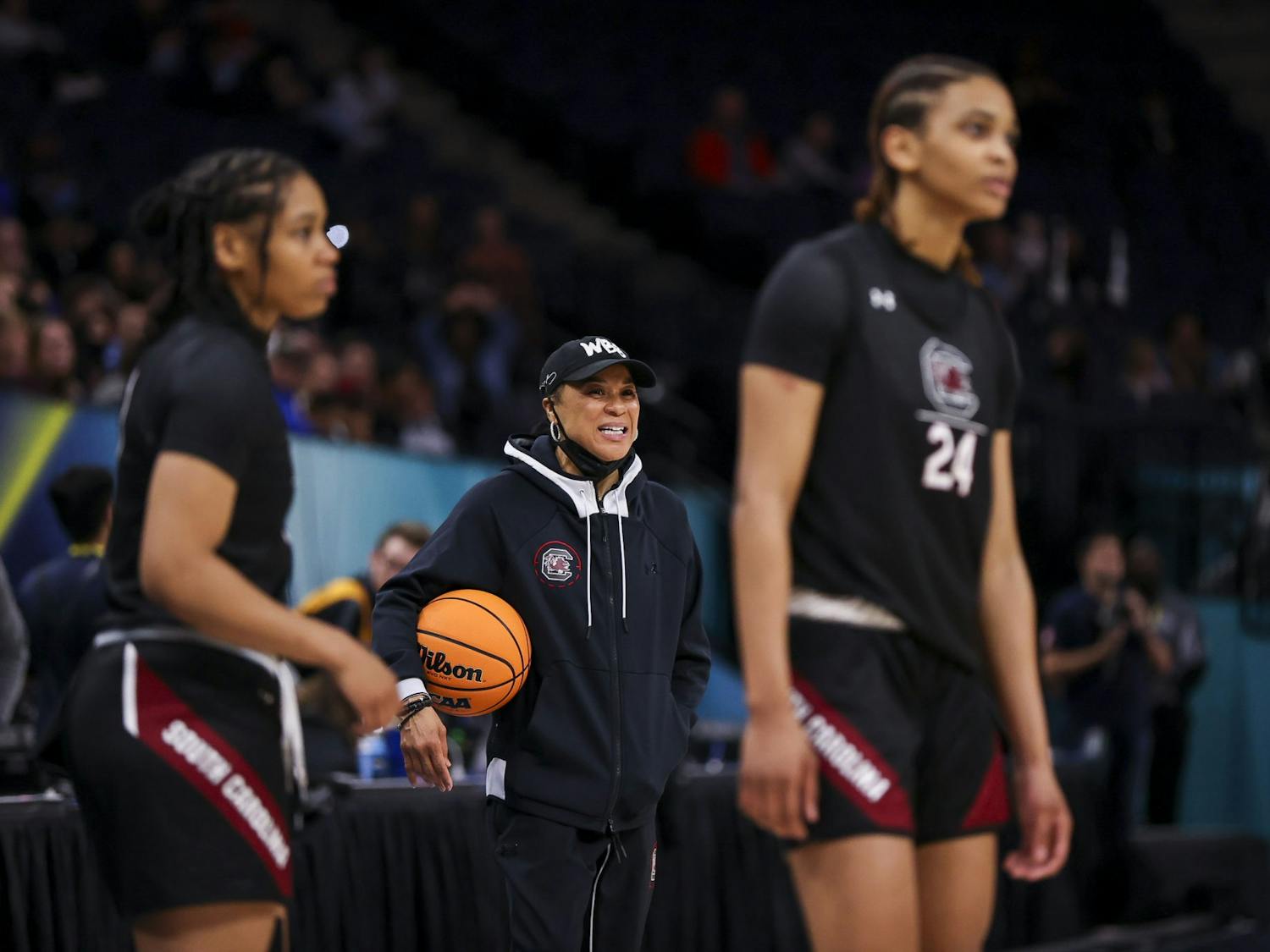 Head coach Dawn Staley watches the Gamecocks during open practice in the Target Center on April 2, 2022.