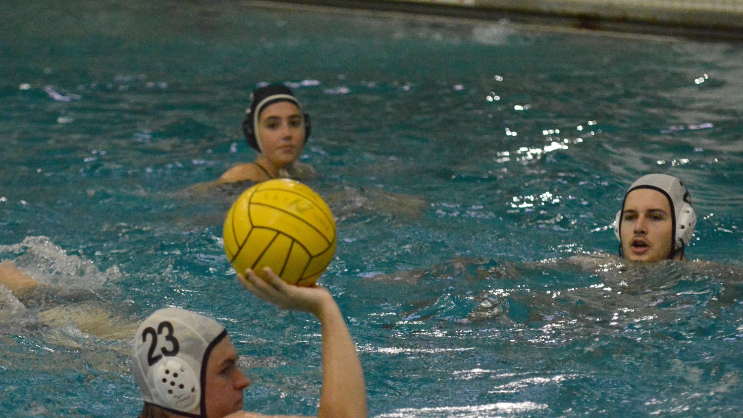 Third-year Conor O'Shea and fourth-year Christian McCormick practice with the Gamecock Water Polo Club on October 3, 2023, in Blatt PEC's pool. The rise of club sports has helped boost the team's attendance numbers.