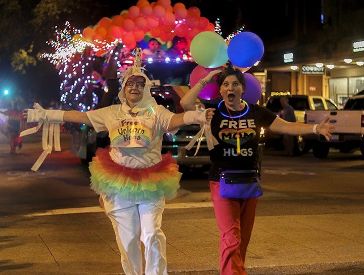 Women offer hugs as they march in the parade at SC Pride this weekend.