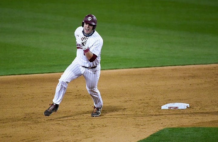 Junior infielder/catcher Wes Clarke rounds the bases during a game. Clarke currently has nine home-runs in 14 games this season.&nbsp;