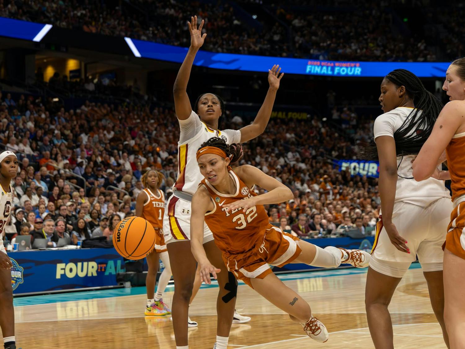 Freshman forward Joyce Edwards defends a Texas player, forcing the ball out of bounds on April 4, 2025 at Amalie Arena. Edwards scored 13 points, had 11 rebounds and one steal for the Gamecocks.