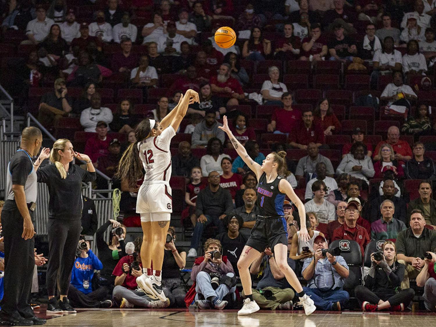 Senior guard Brea Beal scores a 3-pointer during the first quarter of the matchup between South Carolina and Florida at Colonial Life Arena on Feb. 16, 2023. The Gamecocks beat the Gators 87-56.&nbsp;
