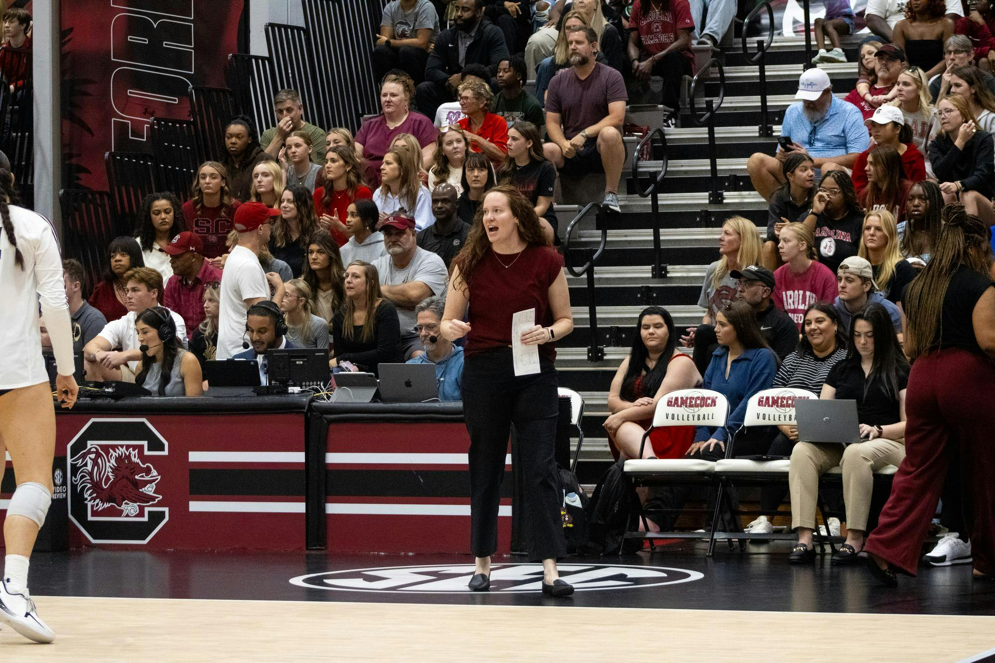 Head coach Sarah Rumely Noble cheers on her team against the University of Georgia on Oct. 5, 2025, at the Carolina Volleyball Center. The Gamecocks took a loss to Georgia 3-1.
