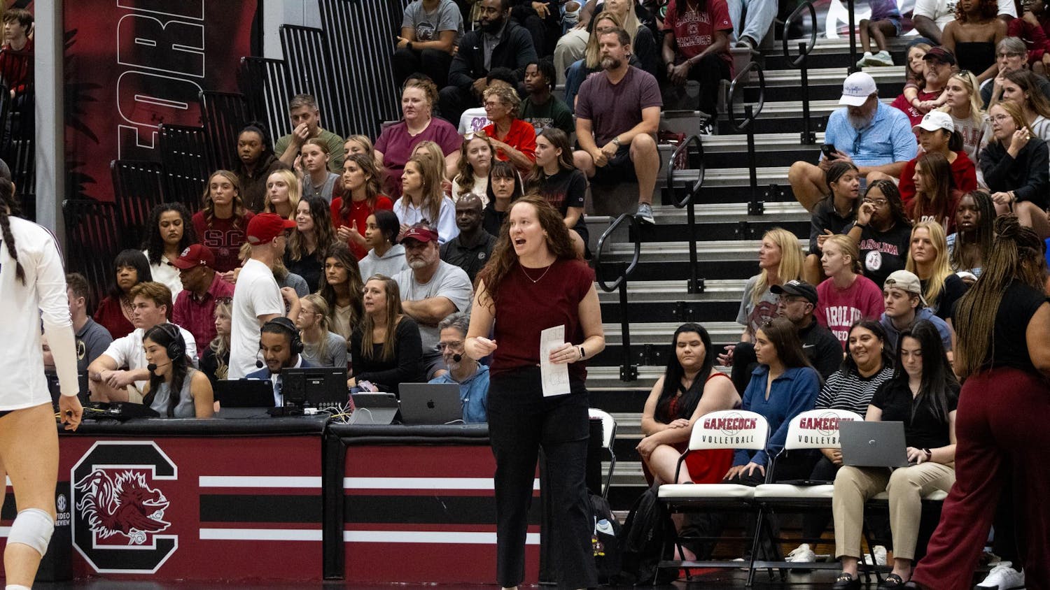 Head coach Sarah Rumely Noble cheers on her team against the University of Georgia on Oct. 5, 2025, at the Carolina Volleyball Center. The Gamecocks took a loss to Georgia 3-1.