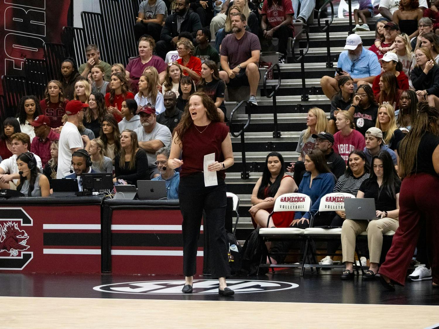 Head coach Sarah Rumely Noble cheers on her team against the University of Georgia on Oct. 5, 2025, at the Carolina Volleyball Center. The Gamecocks took a loss to Georgia 3-1.