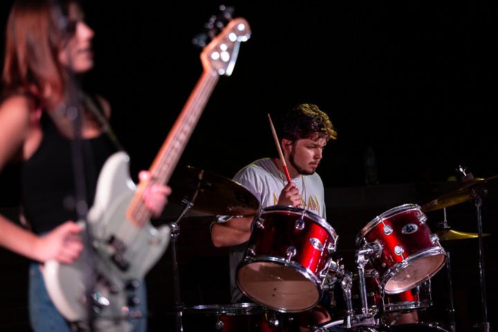 The House Band's bassist, fourth-year mathematics student Madison Adams (left), and drummer, second-year sport and entertainment management student Zach Lambert, perform at the Battle of the Bands on Oct. 5, 2022. The House Band won the competition and will be performing at the UofSC Homecoming block party on Oct. 5, 2022.