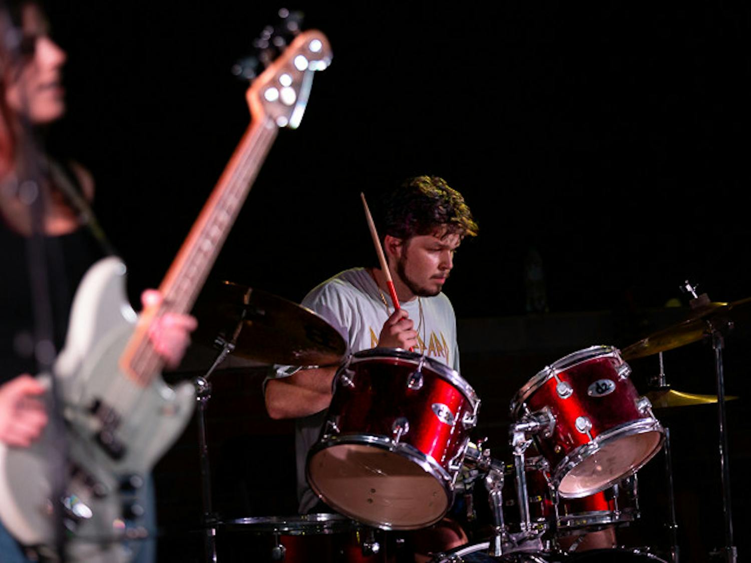 The House Band's bassist, fourth-year mathematics student Madison Adams (left), and drummer, second-year sport and entertainment management student Zach Lambert, perform at the Battle of the Bands on Oct. 5, 2022. The House Band won the competition and will be performing at the UofSC Homecoming block party on Oct. 5, 2022.