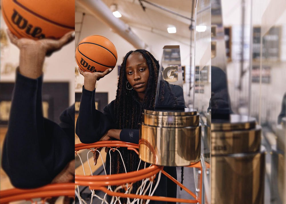<p>Gamecock women's basketball signee forward Joyce Edwards poses for a photo with her Gatorade Player of the Year trophy on March 27, 2024. Edwards played on the Camden High School varsity basketball team for six seasons and committed to play at USC on Nov. 15, 2023.</p>