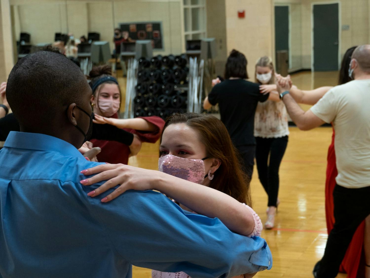 Participants of the Carolina Ballroom Dance Club learn the waltz during its practice on Feb. 15, 2022. Members of the club come together to learn a variety of classical dances including the tango, samba and Cha cha, holding the motto of “if you can walk, you can dance.”