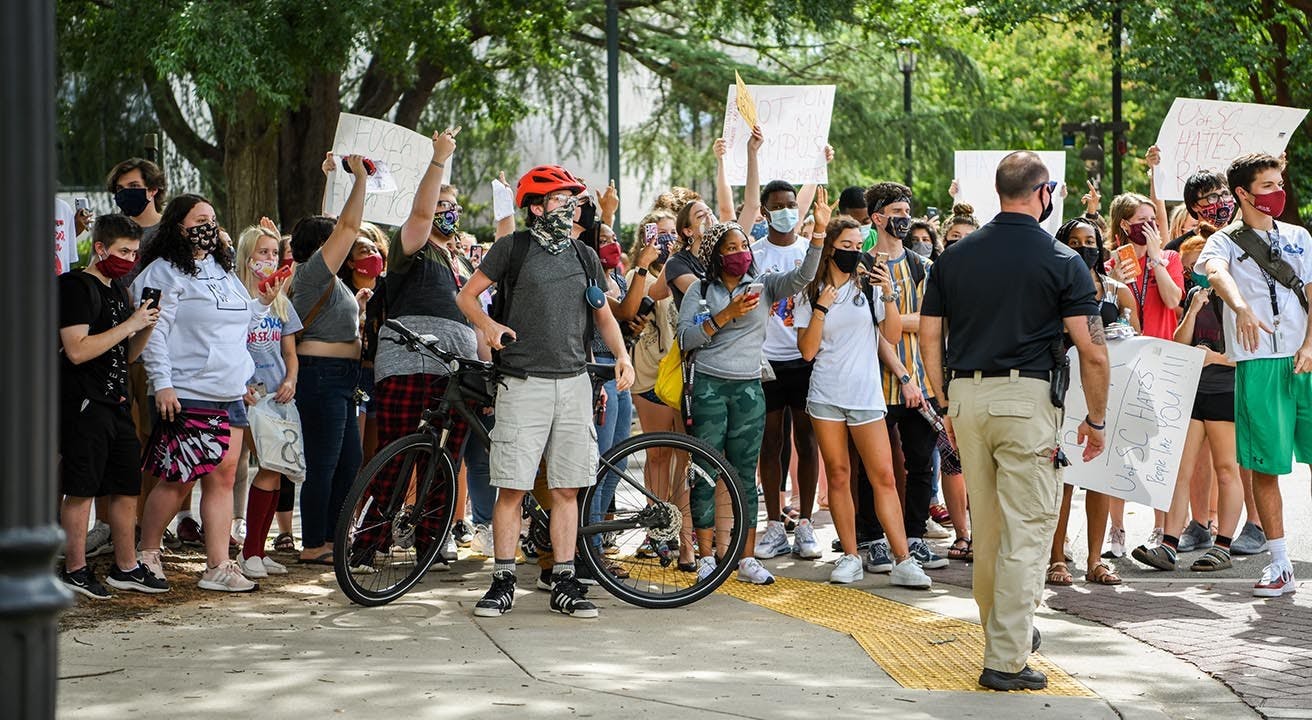 &nbsp;Students celebrate Jim Gilles leaving Greene Street after he preached racist ideas to the student body that protested him. The students sang "na na hey hey kiss him goodbye" by Steam as he left.&nbsp;
