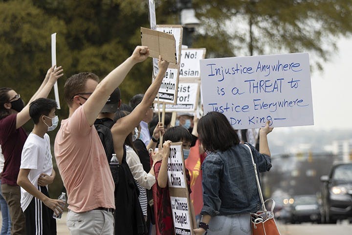 A group of protesters gather outside the South Carolina Statehouse to speak out against anti-Asian hate. The protest follows events that occurred in Atlanta, GA a week earlier.