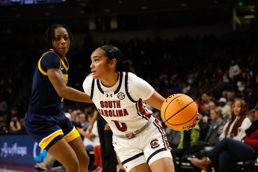 <p>FILE - Senior guard Te-Hina Paopao dribbles the ball during the game against Coppin State on Nov. 14, 2024. </p>