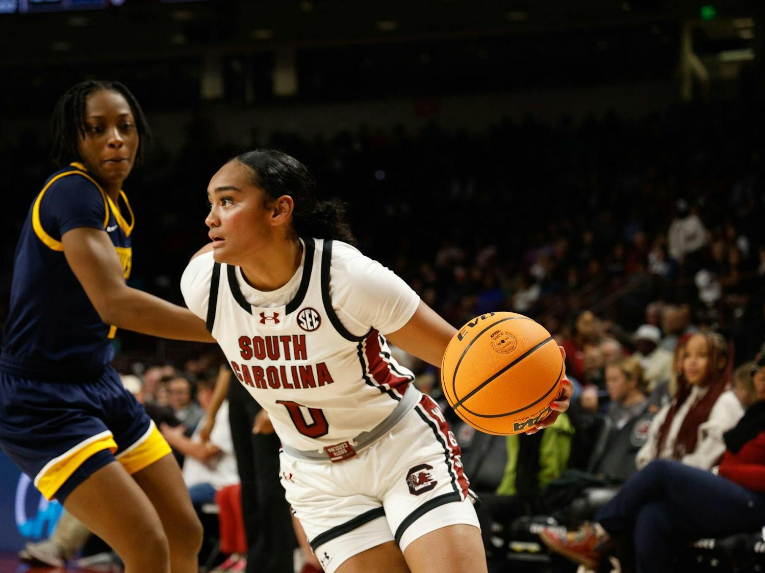 FILE - Senior guard Te-Hina Paopao dribbles the ball during the game against Coppin State on Nov. 14, 2024.