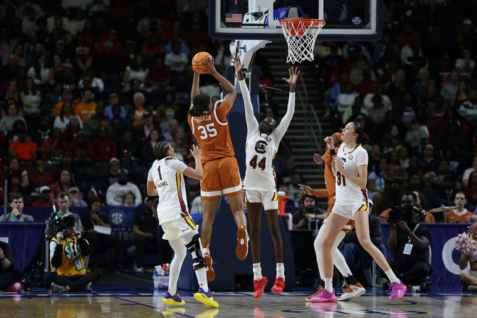 Freshman guard Agot Makeer contests a mid-range shot by a Texas player on March 8, 2026, during the SEC Championship game at Bon Secours Wellness Arena. The Gamecocks fell short to the Longhorns 78-61.