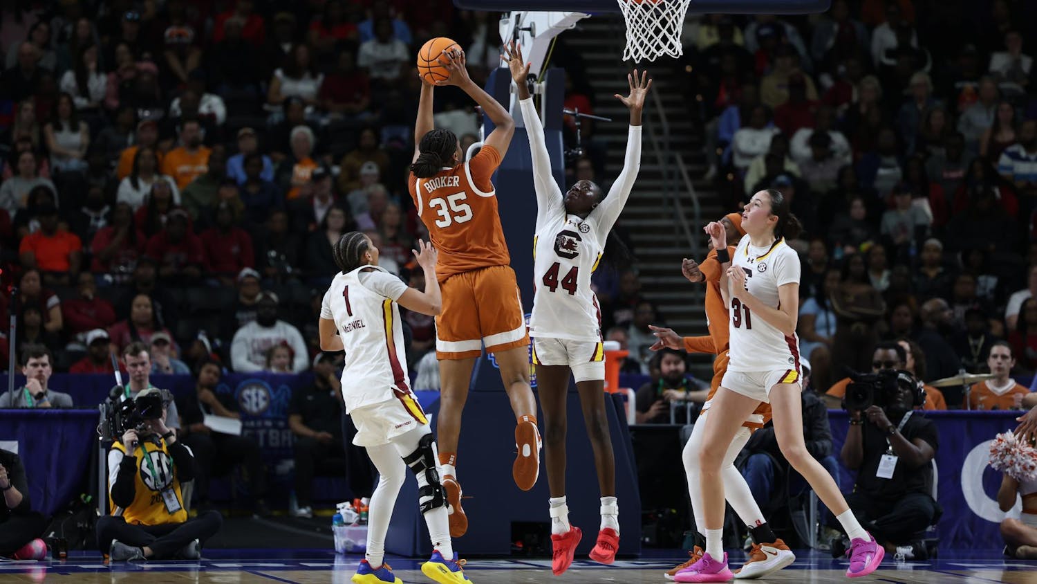 Freshman guard Agot Makeer contests a mid-range shot by a Texas player on March 8, 2026, during the SEC Championship game at Bon Secours Wellness Arena. The Gamecocks fell short to the Longhorns 78-61.